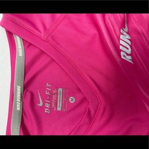 Pink. Nike, running/workout long sleeve shirt. Worn once. Great condition!